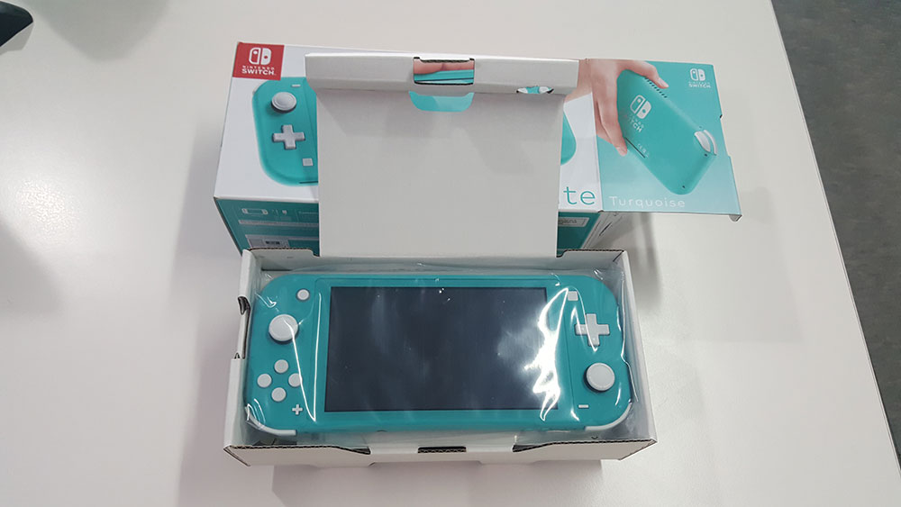 Unboxing Nintendo Switch Lite (Turquoise) - Quedank