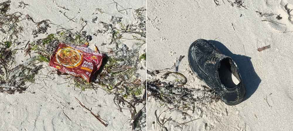 trash by the beach of Boracay