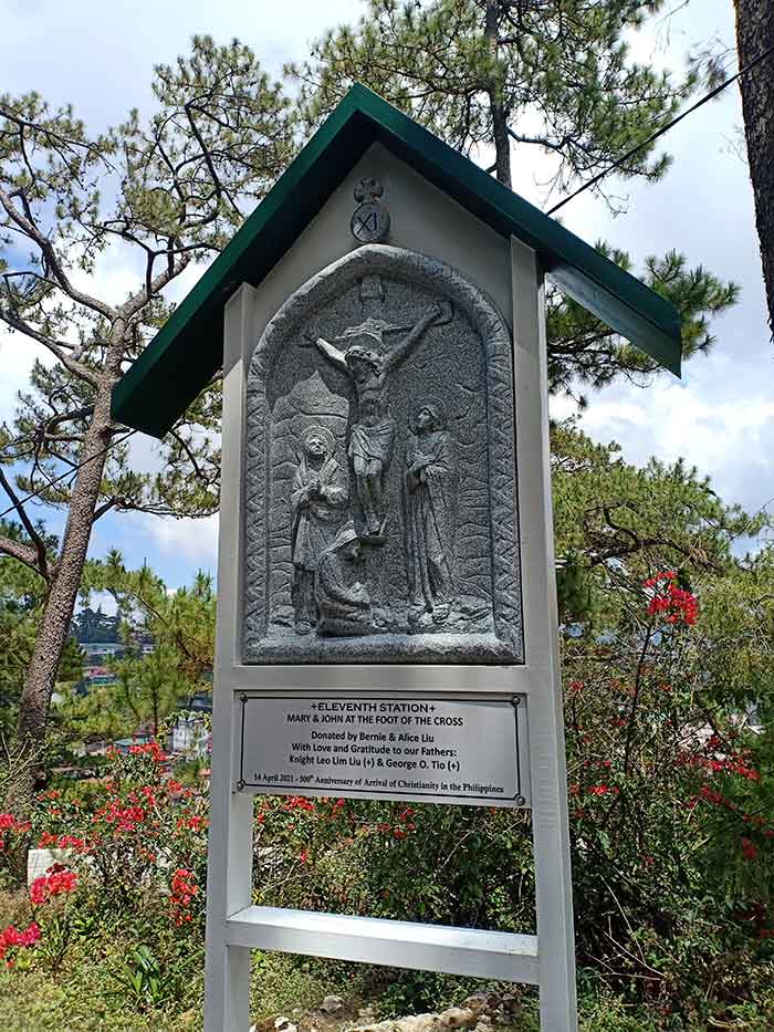 Stations of the Cross prayer guide on the way up the grotto
