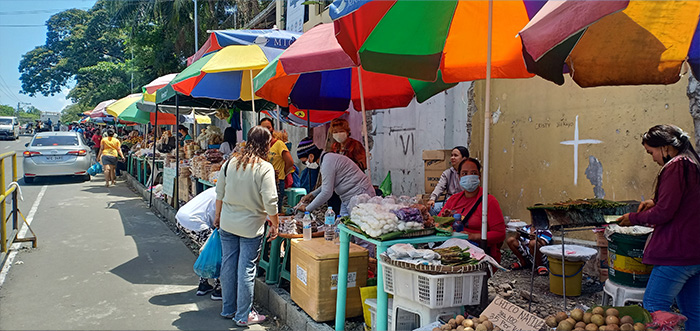 Vendors selling puto and tupig