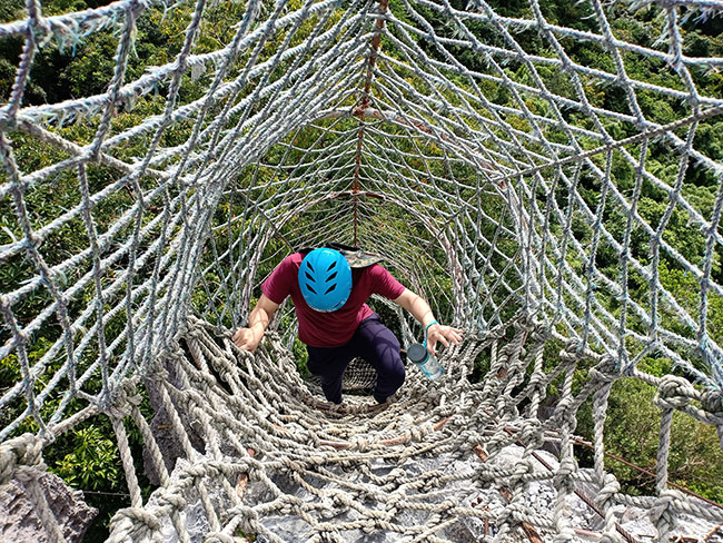 Rope nets that serve as ladders to get down from the rocky hill in Masungi Georeserve